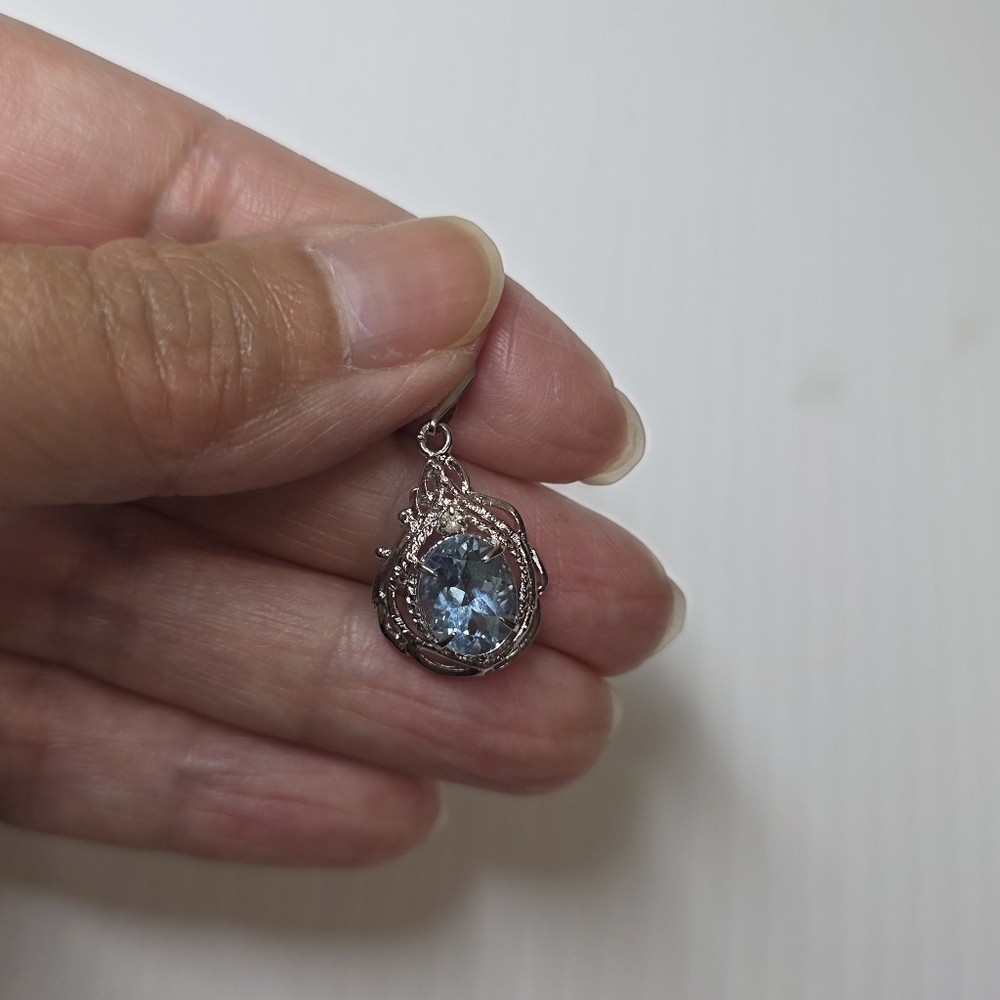 vintage blue gemstone silver toned pendant
